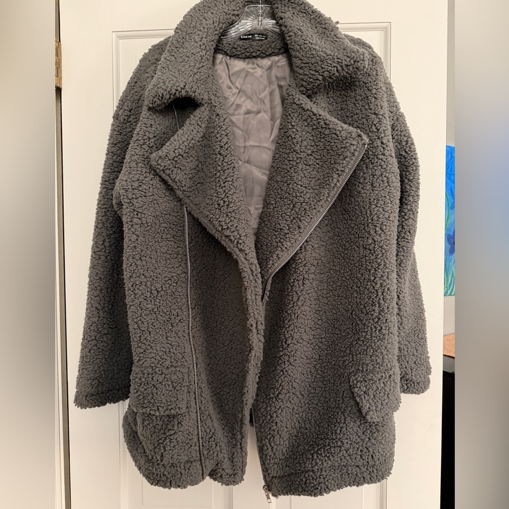NWOT. Never worn.  Cozy Fleece Jacket.